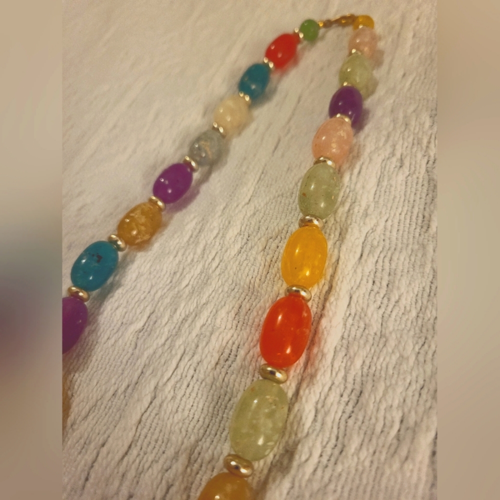 Beaded necklace, multicolor, beads are speckled/marbled like.